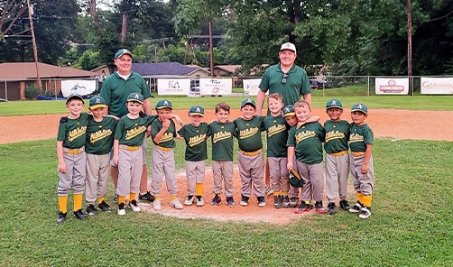 Doctor Markle and youth baseball team