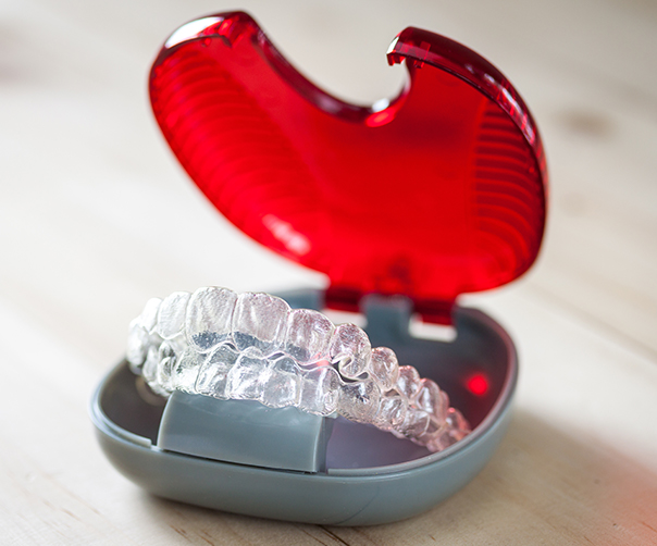 Clear Invisalign trays in carrying case